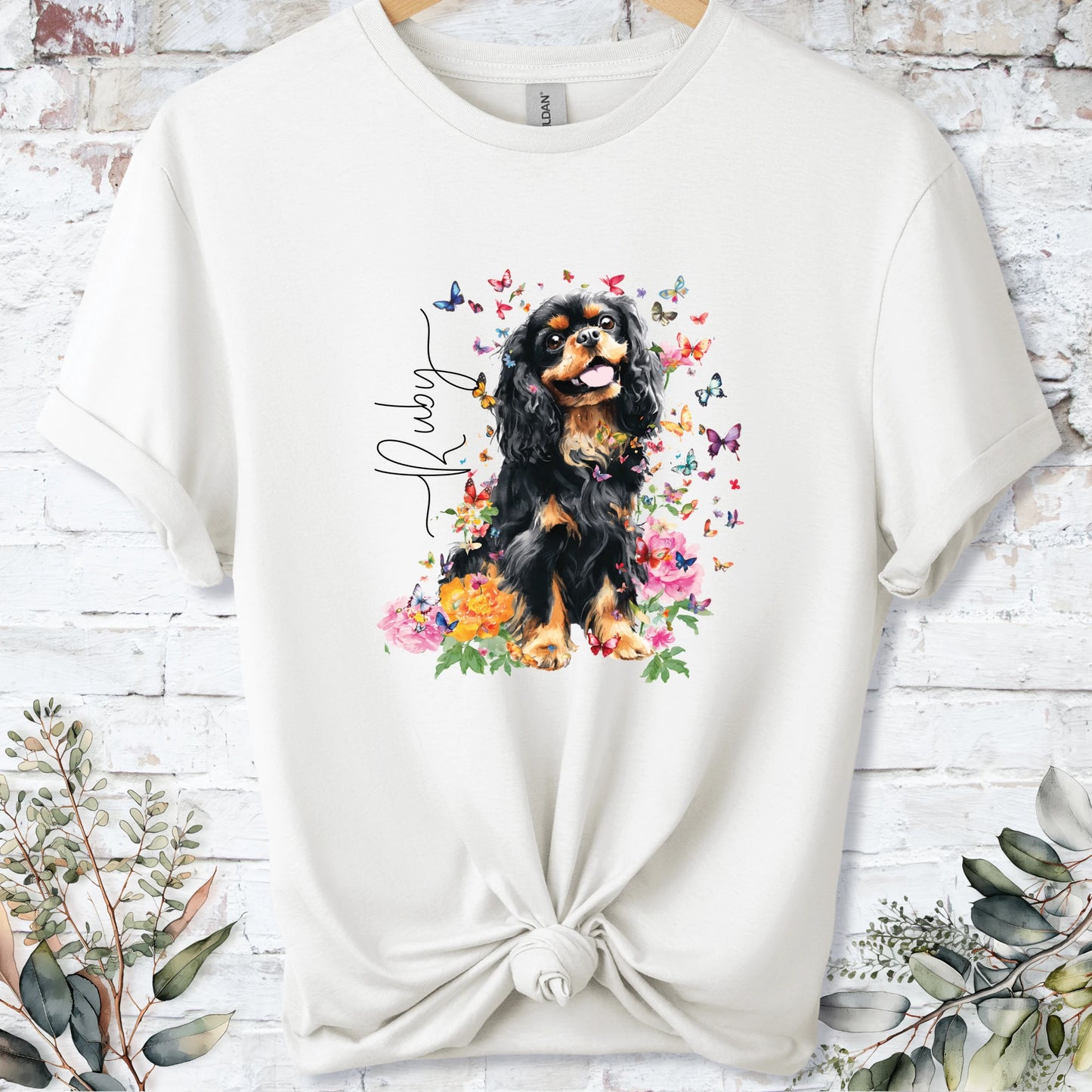 https://wescale-cdn.com/generated-mockups/bf472b68-5c1c-44c3-a409-4b955cabfa92/d92796e4-0b4a-49a8-9b82-c33aee0d3dfc/3e8a5956-7015-46e5-b1dc-8a0d0bd2176b_designs/cavalier_king_charles_spaniel_4_personalised_unisex_t_shirt_2_1777155983284_nmo7c9.png_1777155986319.webp
