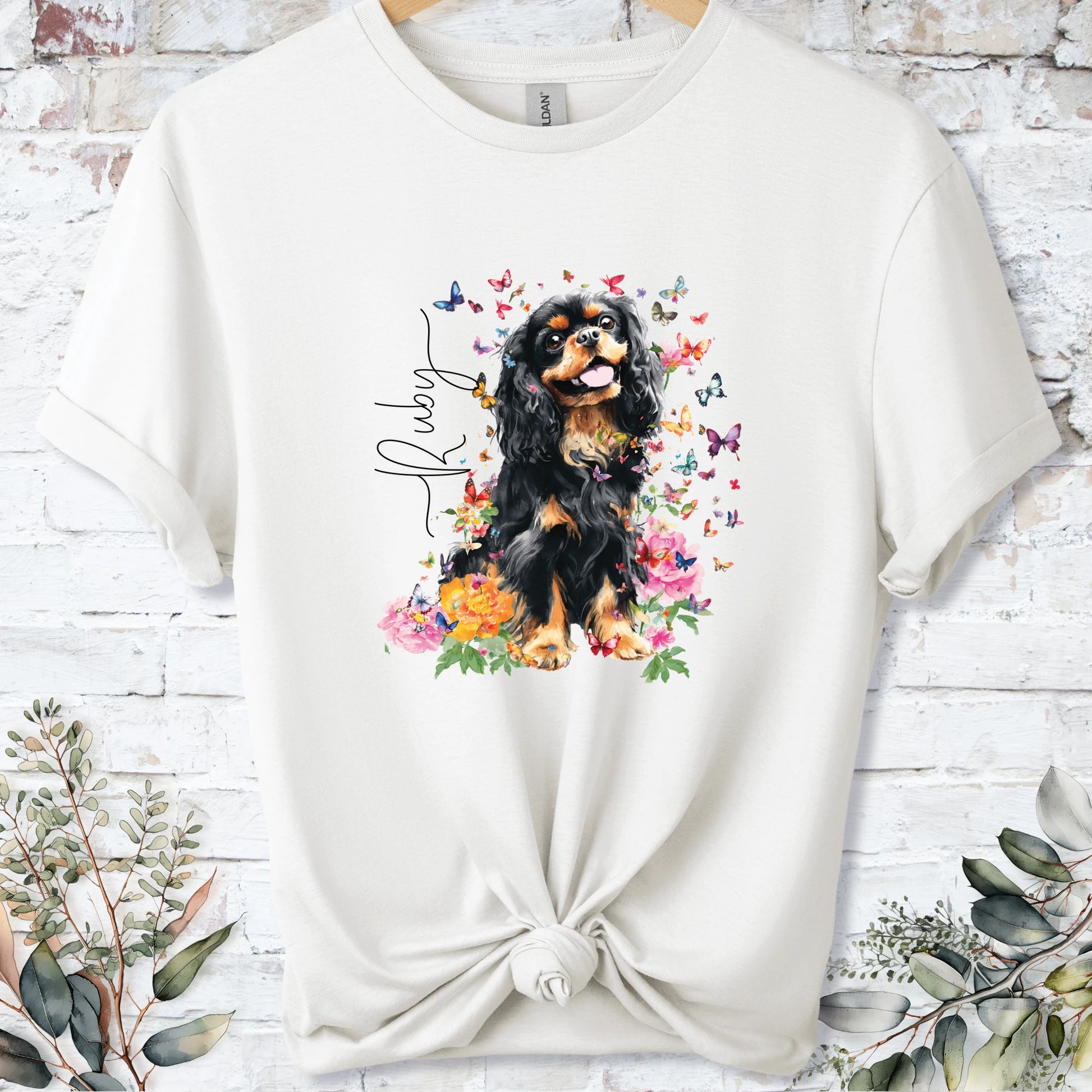 https://wescale-cdn.com/generated-mockups/bf472b68-5c1c-44c3-a409-4b955cabfa92/d92796e4-0b4a-49a8-9b82-c33aee0d3dfc/3e8a5956-7015-46e5-b1dc-8a0d0bd2176b_designs/cavalier_king_charles_spaniel_4_personalised_unisex_t_shirt_2_1777155983284_nmo7c9.png_1777155986319.webp