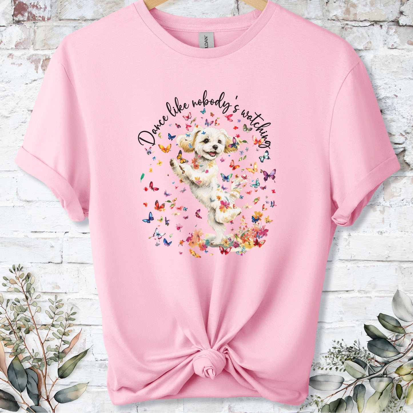 https://wescale-cdn.com/generated-mockups/bf472b68-5c1c-44c3-a409-4b955cabfa92/69acafd1-585e-4806-952c-4f06a54c82f8/37dc3834-33f9-47c9-b73e-9085ff95e0d1_designs/cavichon_2_dance_like_nobody_s_watching_unisex_t_shirt_2_1777545699109_na4k06.png_1777545700188.webp