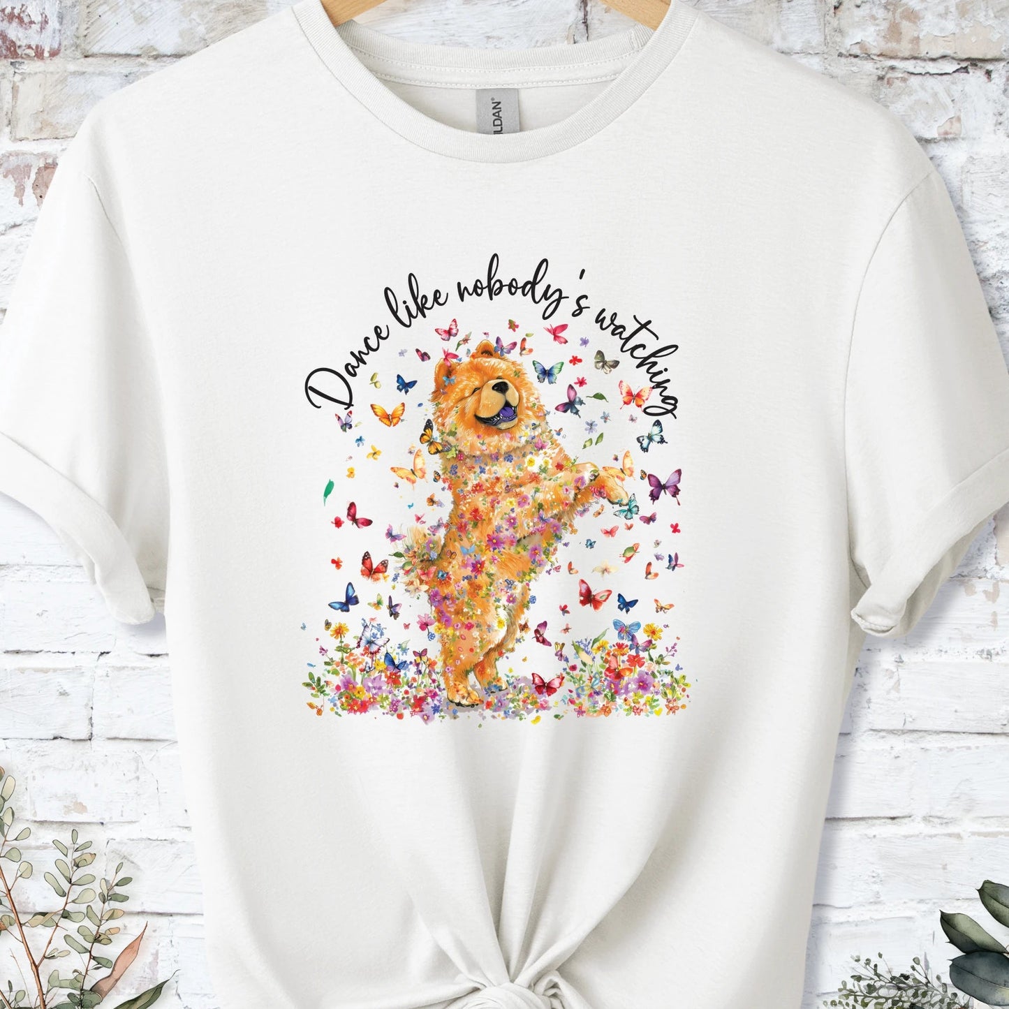 https://wescale-cdn.com/generated-mockups/bf472b68-5c1c-44c3-a409-4b955cabfa92/9ce183f2-90e3-413c-979a-9e5c003c14d8/3e8a5956-7015-46e5-b1dc-8a0d0bd2176b_designs/chow_chow_2_dance_like_nobody_s_watching_unisex_t_shirt_1_1777003109720_pcxysz.png_1777003112870.webp