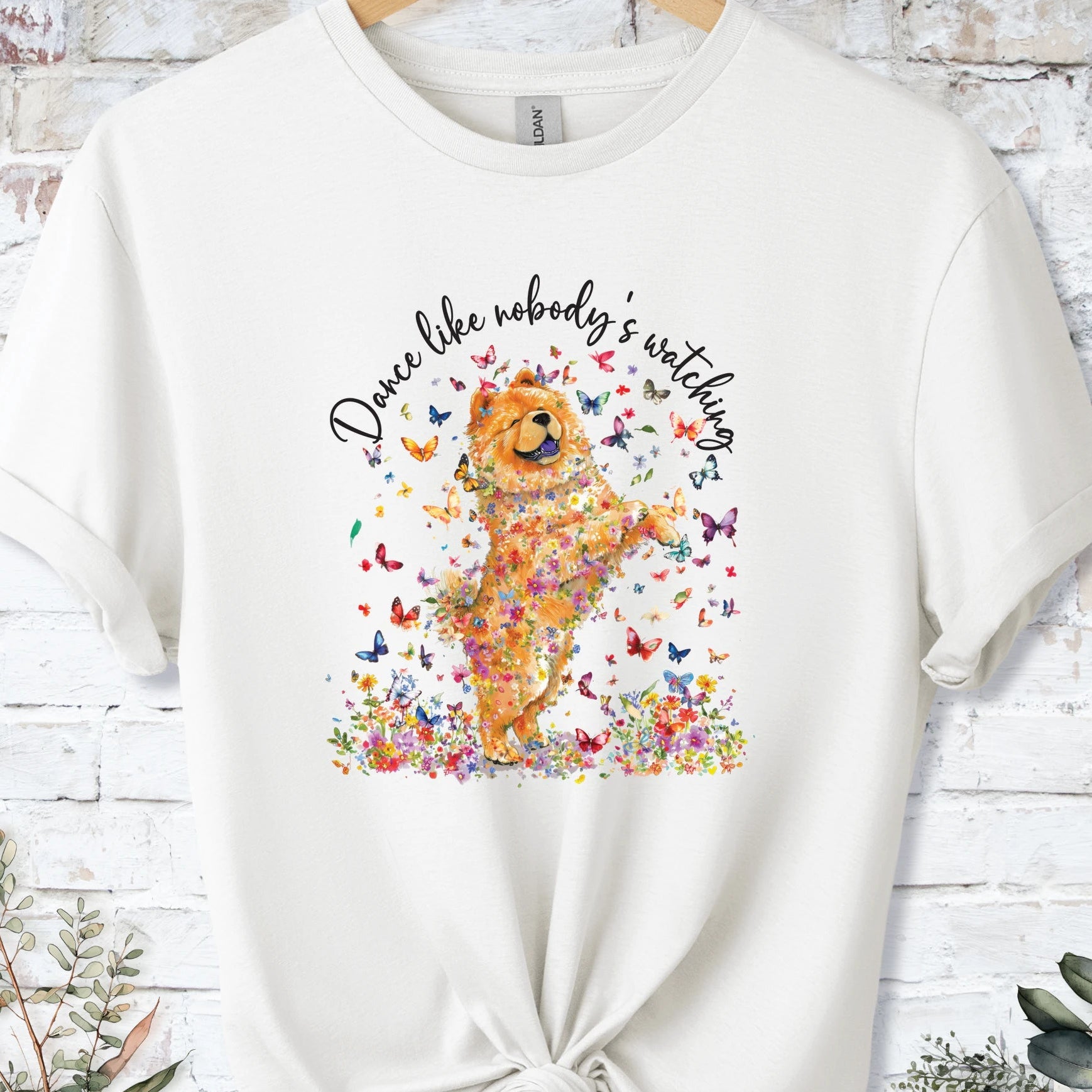 https://wescale-cdn.com/generated-mockups/bf472b68-5c1c-44c3-a409-4b955cabfa92/9ce183f2-90e3-413c-979a-9e5c003c14d8/3e8a5956-7015-46e5-b1dc-8a0d0bd2176b_designs/chow_chow_2_dance_like_nobody_s_watching_unisex_t_shirt_1_1777003109720_pcxysz.png_1777003112870.webp