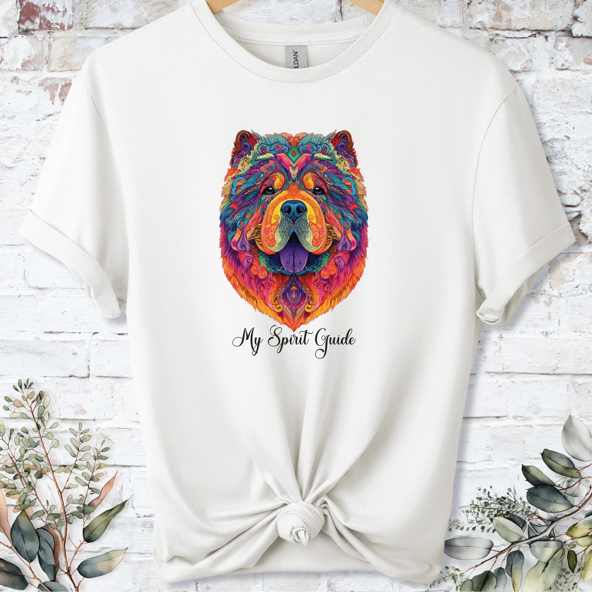 https://wescale-cdn.com/generated-mockups/bf472b68-5c1c-44c3-a409-4b955cabfa92/777d5de0-6633-4da6-bb60-6e705ab5f1a8/1aa60b49-b78b-4aef-a7bc-aa75b33b3990_designs/chow_chow_spirit_guide_unisex_t_shirt_1_1776813852669_pm35sa.png_1776813855858.webp
