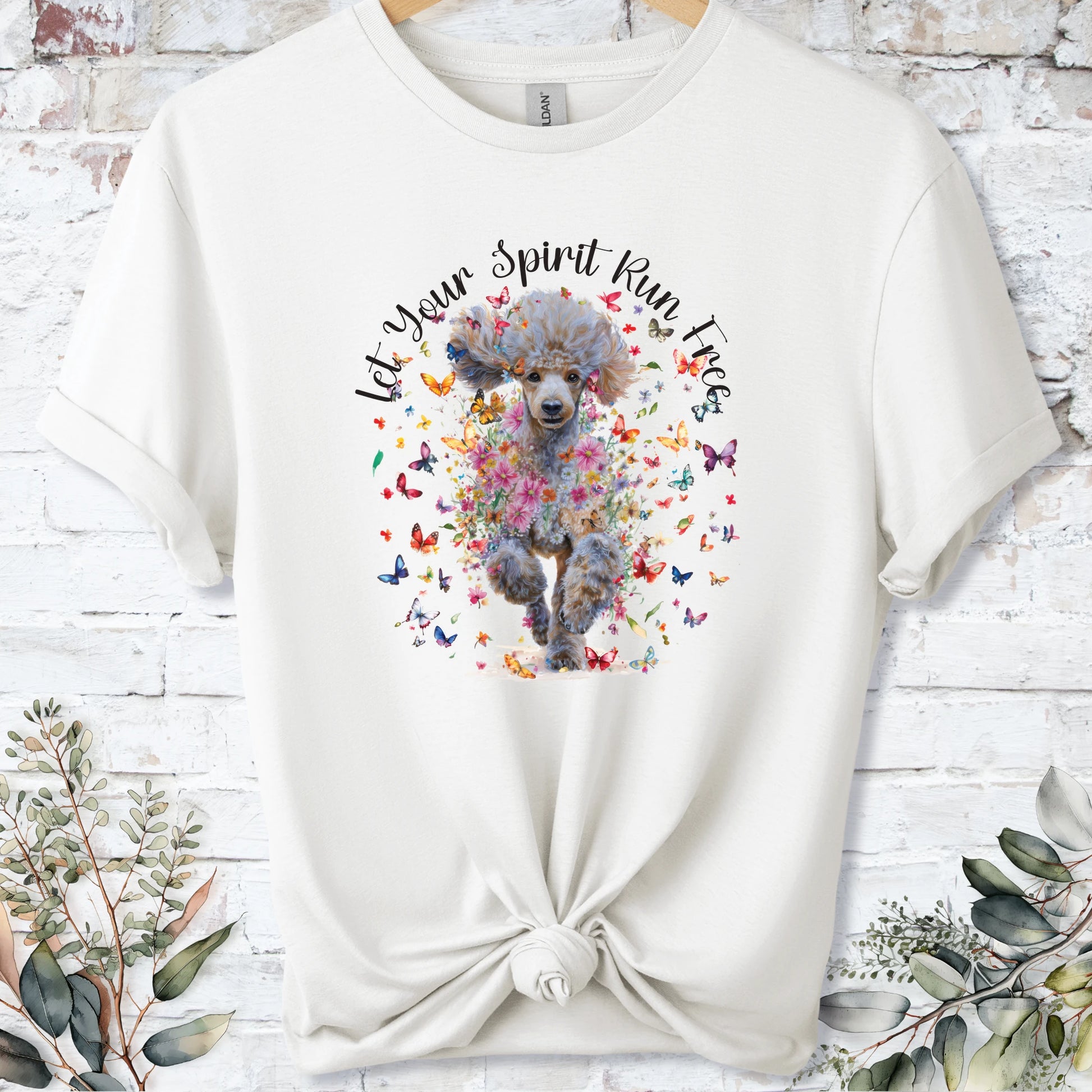 https://wescale-cdn.com/generated-mockups/bf472b68-5c1c-44c3-a409-4b955cabfa92/9ce183f2-90e3-413c-979a-9e5c003c14d8/3e8a5956-7015-46e5-b1dc-8a0d0bd2176b_designs/poodle_5_let_your_spirit_run_free_unisex_t_shirt_2_1777003081484_4vacw2.png_1777003084608.webp