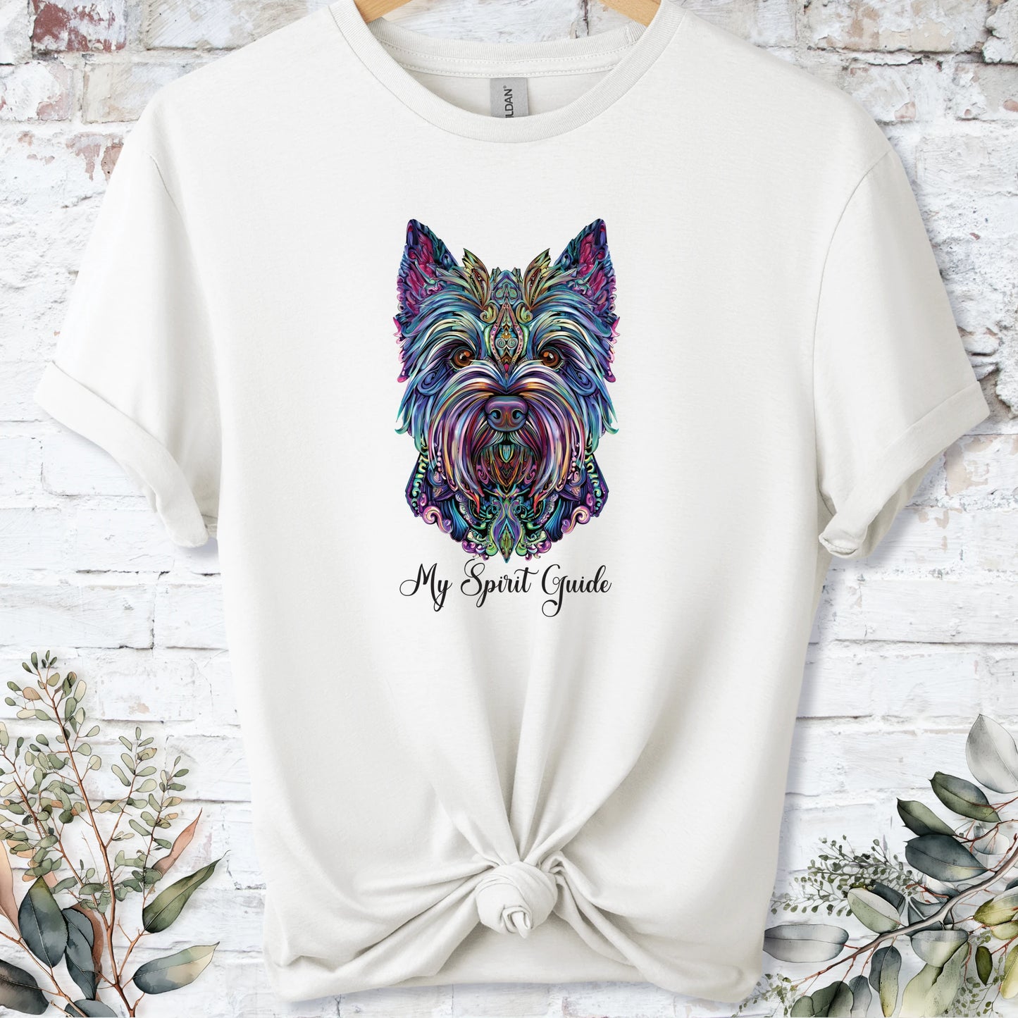 https://wescale-cdn.com/generated-mockups/bf472b68-5c1c-44c3-a409-4b955cabfa92/3d66f02e-1367-4c28-91e0-d35935f9bfb1/1aa60b49-b78b-4aef-a7bc-aa75b33b3990_designs/west_highland_terrier_1_spirit_guide_unisex_t_shirt_1_1776898170618_bfhi8h.png_1776898172729.webp